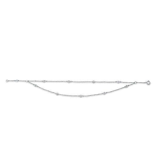 Armband 18 kt WG, 9 Brill. 0,19 ct, W-si