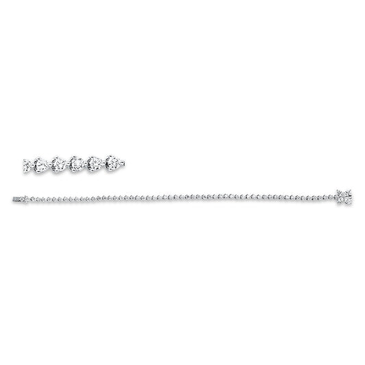 Armband 18 kt WG, 4 Nav. 0,56 ct, TW-vsi, 58 Brill. 2,20 ct, TW-vsi