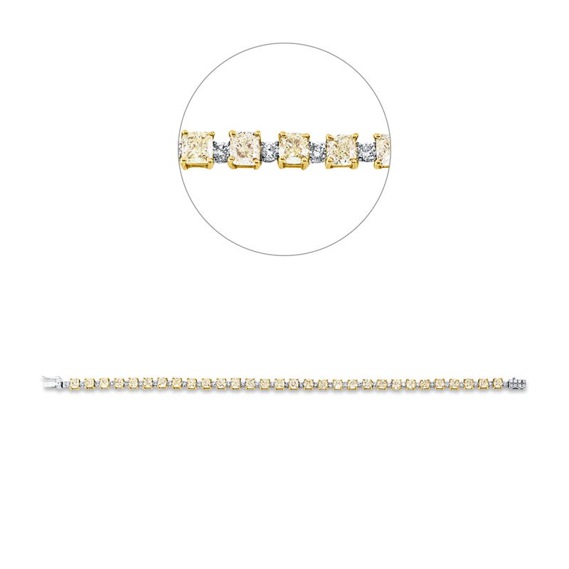 Armband 18 kt GG+WG, 8 Brill. 0,11 ct, W-pi, 31 Brill. 1,43 ct, W-pi, 30 Cushion 8,38 ct, gelb