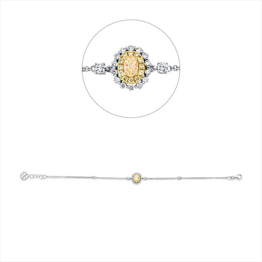Armband 18 kt WG+GG,  12 Brill. 0,10 ct, 1 Oval 0,34 ct, gelb, 4 Brill. 0,20 ct, 14 Brill. 0,18 ct, TW-si