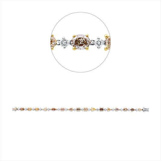 Armband 18 kt GG+WG, 17 Brill. 1,31 ct, TW-pi, 17 Fant-Schl. 7,83 ct, fancy