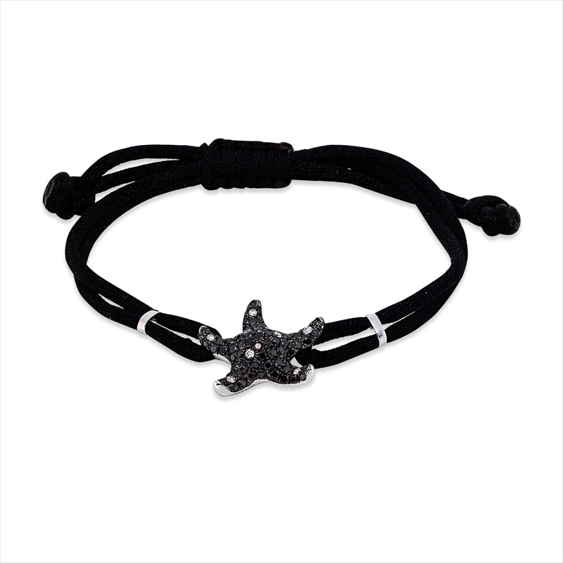 Armband 18 kt WG, schwarz cord, 61 Brill.0,51ct, TW-pi, 2 Brill.0,04ct, schwarz, 69 Saphire 0,68ct gelb