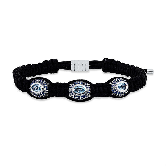 Armband 18 kt WG, schw cord, 6 Brill. 0,04 ct, I-vsi, 3 Top 1,67 ct blau, 126 Sap 0,81 ct blau