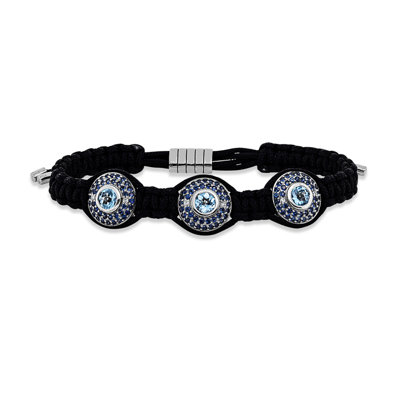 Armband 18 kt WG, schwarzes cord, 6 Brill. 0,06 ct, I-si, 3 Topase 1,66 ct blau, 120 Saphire 1,40 ct blau