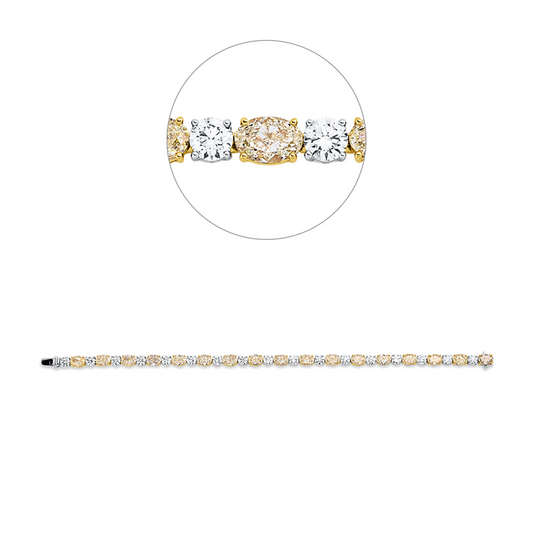 Armband 18 kt WG+GG, 17 Brill. 4,28 ct, TW-si, 17 Oval 10,11 ct, gelb