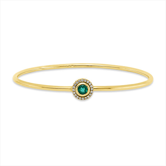 Armreif 14 kt GG, 20 Brill. 0,08 ct, TW-si, 1 Smaragd 0,27 ct grün