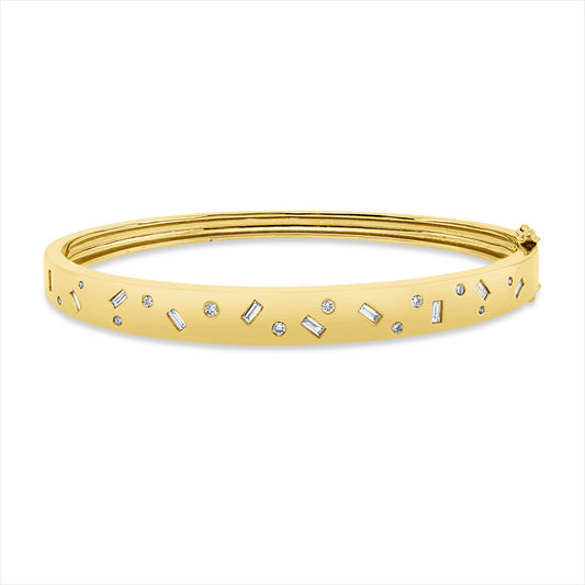 Armreif 18 kt GG, 10 Bag. 0,30 ct, TW-si, 12 Brill. 0,17 ct, TW-si
