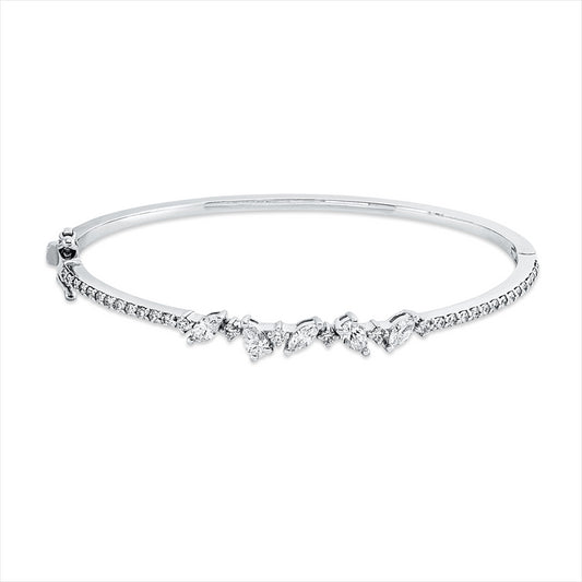 Armreif 18 kt WG, 3 Nav. 0,32 ct, F/TW-si, 2 Tropfen 0,34 ct, F/TW-si, 32 Brill. 0,68 ct, F/TW-si