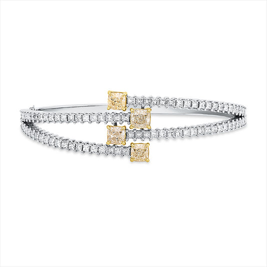 Armreif 18 kt WG+GG, GIA 4pcs, 4 Cushion 2,00 ct, gelb-vs/si, 84 Princ. 3,03 ct, F-vsi