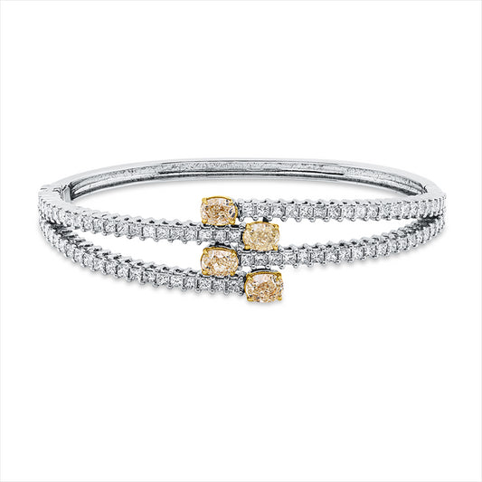 Armreif 18 kt WG+GG, GIA 4pcs, 4 Oval 1,51 ct, gelb-vs/si, 84 Princ. 2,75 ct, F-vsi