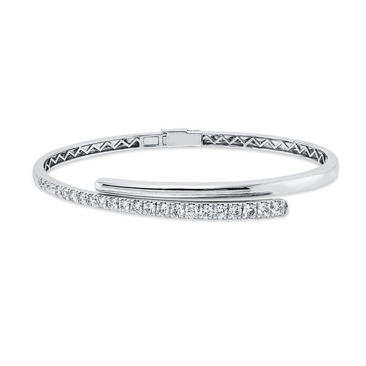 Armreif 14 kt WG, 7 Brill. 0,32 ct, 10 Brill. 0,60 ct, 3 Brill. 0,24 ct, 2 Brill. 0,08 ct, TW-pi