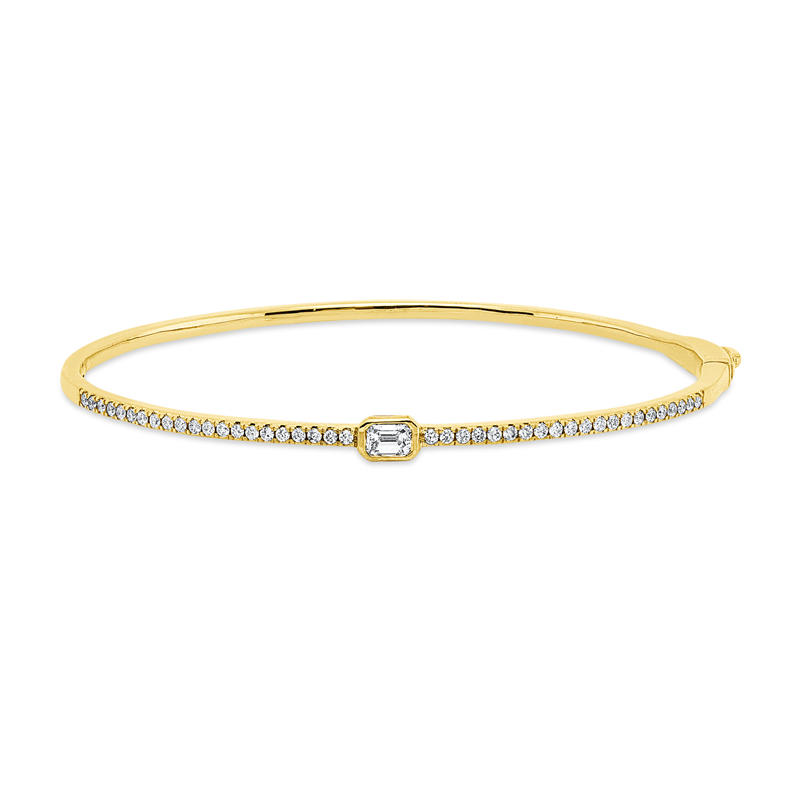 Armreif 18 kt GG, 1 Sm.schliff 0,25 ct, TW-si, 42 Brill. 0,40 ct, TW-si