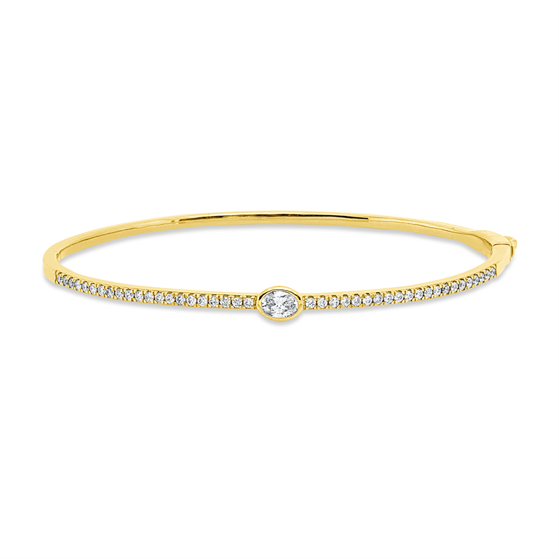 Armreif 18 kt GG, 1 Oval 0,26 ct, TW-si, 42 Brill. 0,39 ct, TW-si