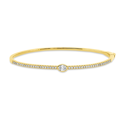 Armreif 18 kt GG, 1 Oval 0,26 ct, TW-si, 42 Brill. 0,39 ct, TW-si