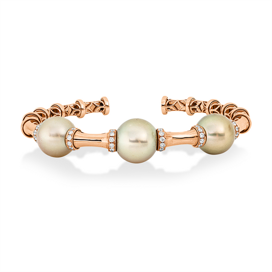 Armreif 18 kt RG, 36 Brill. 0,66 ct, TW-si, 2 SW gold 12,6 mm, 1 SW gold 13,5 mm