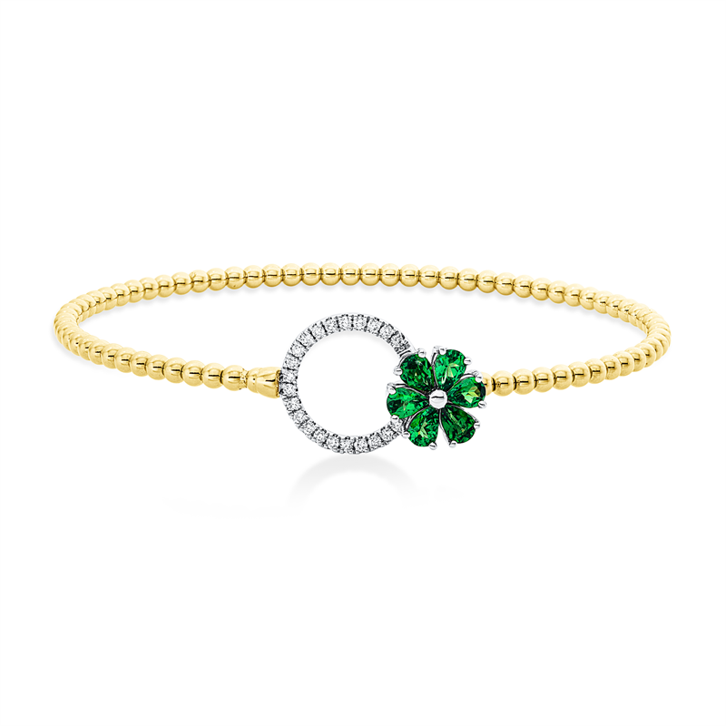 Armreif 18 kt GG+WG, 22 Brill. 0,17 ct, F-vsi, 6 Tsavorith 0,93 ct grün