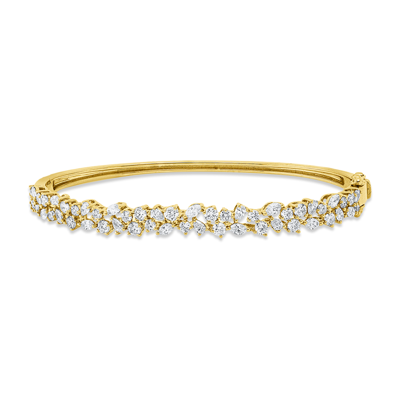 Armreif 18 kt GG, 12 Nav. 0,54 ct, TW-vsi, 12 Tropfen 0,40 ct, TW-si, 29 Brill. 1,22 ct, TW-si