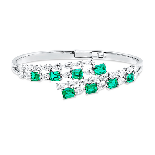 Armreif 18 kt WG, 26 Tropfen 3,42 ct, F-vvs/vs, 8 Smaragde 3,46 ct grün