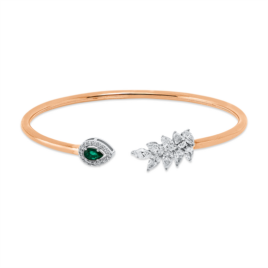 Armreif 18 kt RG+WG, 9  Fant-Schl 1,30 ct, F-vsi, 16 Brill. 0,10 ct, F-vsi, 1 Smaragd 0,27 ct grün