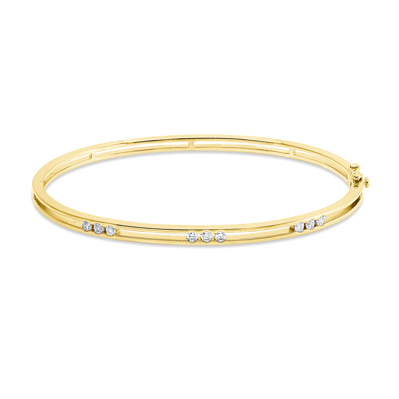 Armreif 18 kt GG, 9 Brill. 0,32 ct, TW-pi
