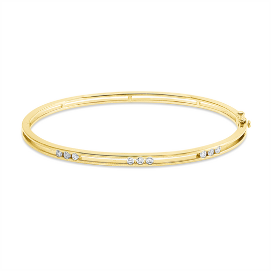 Armreif 18 kt GG, 9 Brill. 0,32 ct, TW-pi