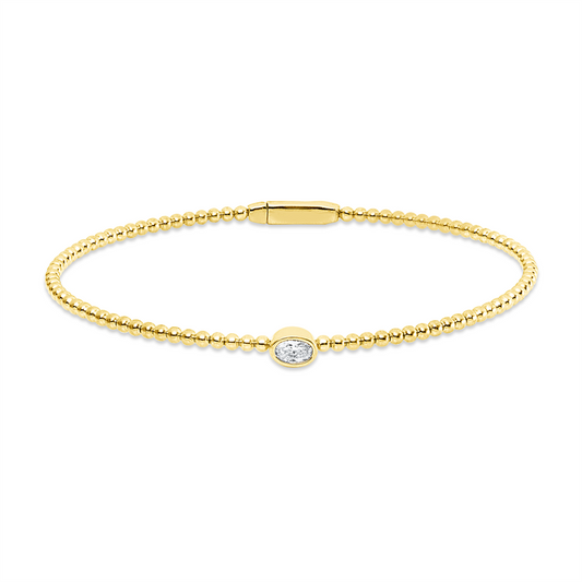 Armreif 18 kt GG, 1 Oval 0,19 ct, TW-si
