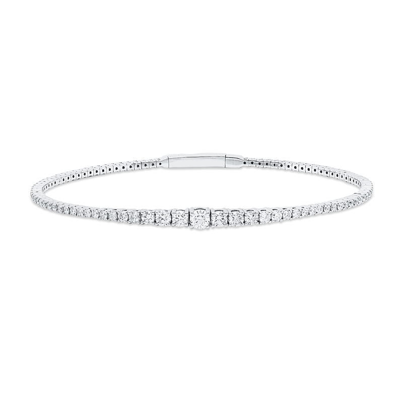 Armreif 18 kt WG, 8 Brill. 0,32 ct, 4 Brill. 0,37 ct, 1 Brill. 0,18 ct, 80 Brill. 1,30 ct, TW-si