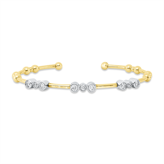 Armreif 14 kt GG+WG, 3 Brill. 0,14 ct, TW-si, 6 Brill. 0,49 ct, TW-si