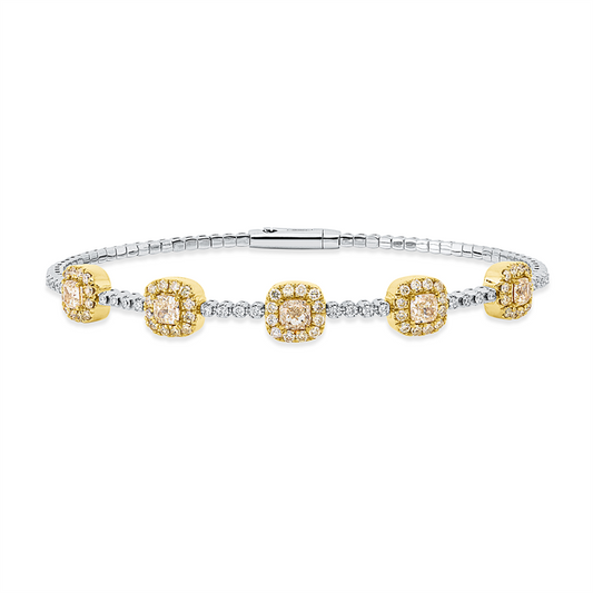 Armreif 950 Pt GP, 60 Brill. 0,71 ct, gelb-si, 5 Cushion 1,51 ct, gelb-vsi, 24 Brill. 0,22 ct, TW-si
