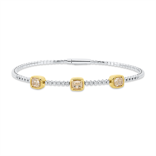 Armreif 950 Pt GP, 3 Cushion 1,49 ct, gelb-vsi, 24 Brill. 0,22 ct, TW-vsi
