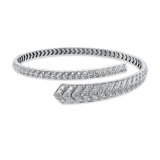 Armreif 18 kt WG, 9 Oval 1,21 ct, TW-si