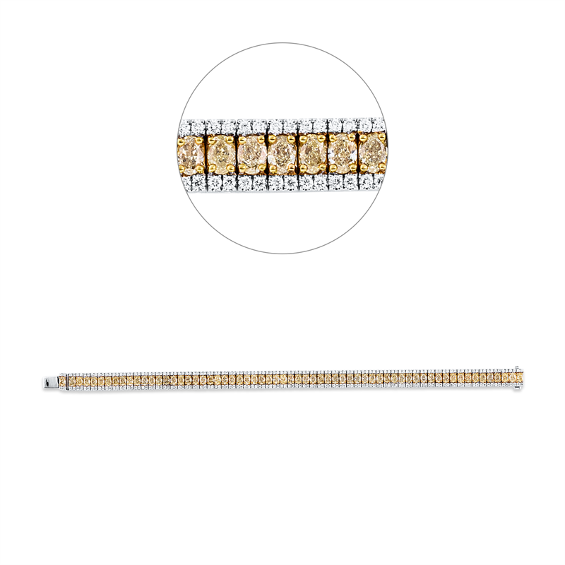 Armreif 18 kt WG+GG, 252 Brill. 1,43 ct, TW-si, 63 Oval 6,98 ct, gelb