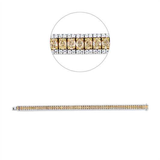 Armreif 18 kt WG+GG, 252 Brill. 1,43 ct, TW-si, 63 Oval 6,98 ct, gelb
