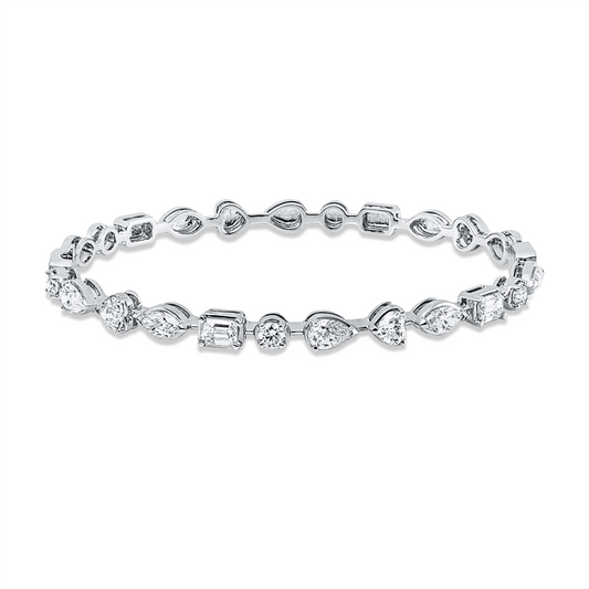Armreif 18 kt WG, 2 Tropfen 0,45 ct, TW-vsi, 3 Nav. 0,56 ct, TW-vsi, 2 Herzschl. 0,39 ct, TW-vsi, 2 Sm.schliff 0,50 ct, TW-vsi, 3 Brill. 0,32 ct, TW-vsi